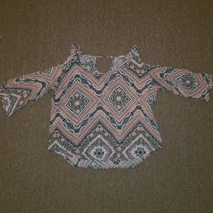 peach and navy patterned top